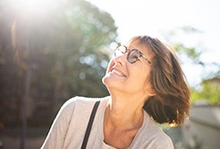 Lady smiles at the sky