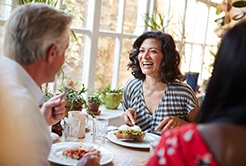 People converse over brunch