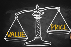 A scale weighing the words value and price
