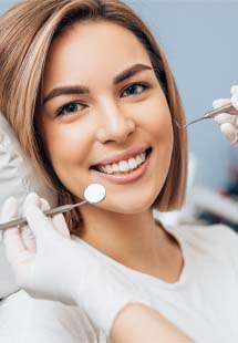 Closeup of woman smiling during dental checkup