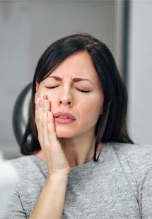 Closeup of woman experience toothache