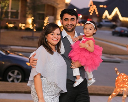 Doctor Patel and his family in front yard