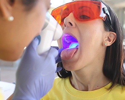 Patient receiving an oral cancer screening