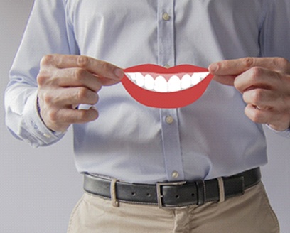 Man holding model of smiling lips