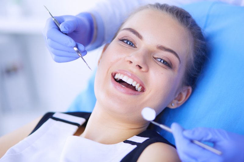 a woman visiting the dentist’s office